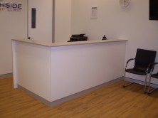 90 Degree Panel Front Reception Desk With Counter Top And Laminate Kick Skirt